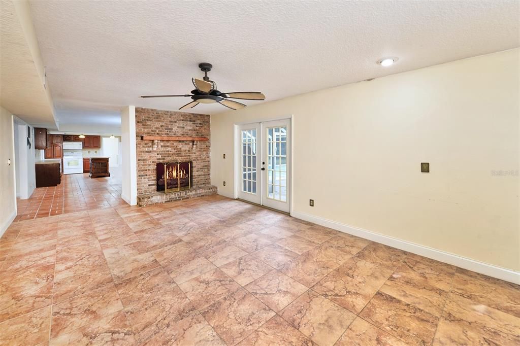 Family room off kitchen with fireplace