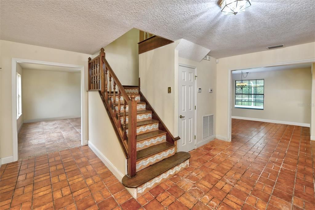 Foyer allows access to the living room, dining room, family room, eat-in kitchen and upstairs