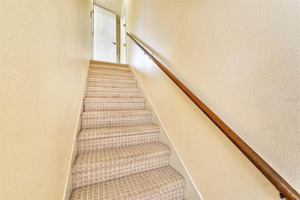 Back stairs off laundry room and garage goes upstairs to the game room and guest bedroom