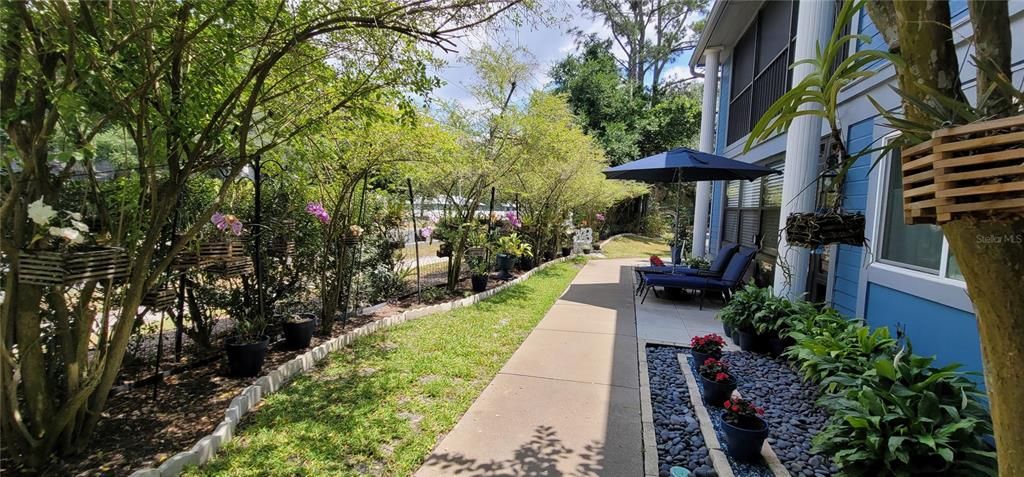 What a great view to come home to! Pretty tropical walkway from parking area to your new home