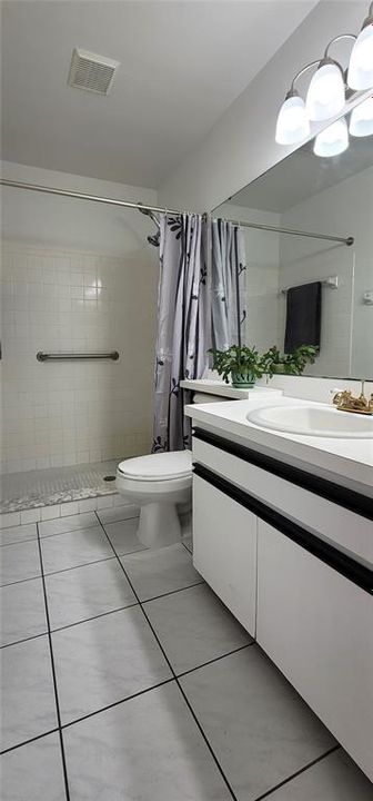 Bathroom 2 - private access from Bedroom 2 AND access from your main rooms. BIG walk-in shower!