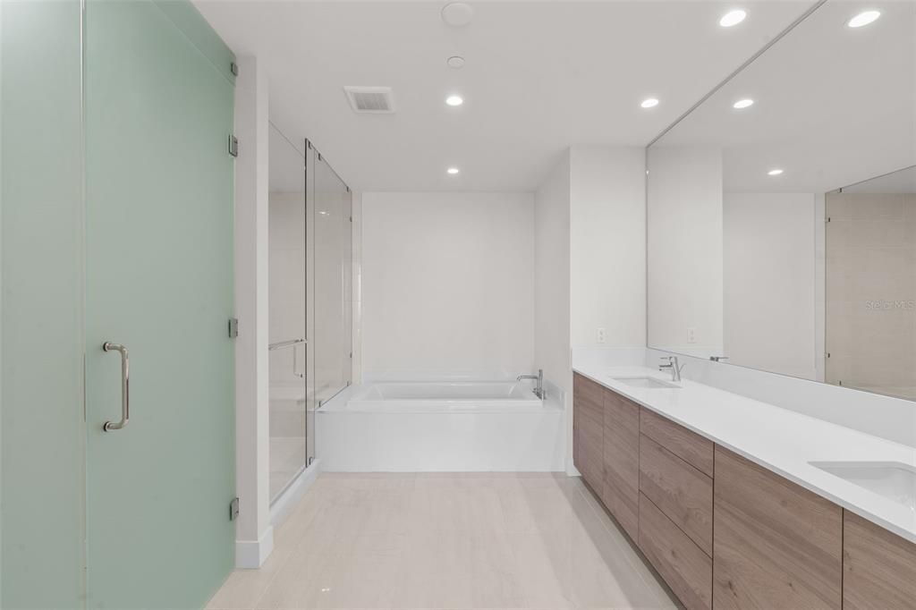 Very spacious master bath including garden tub separate from the walk-in shower.