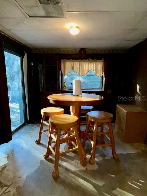 Dinning area w/ built in shelving