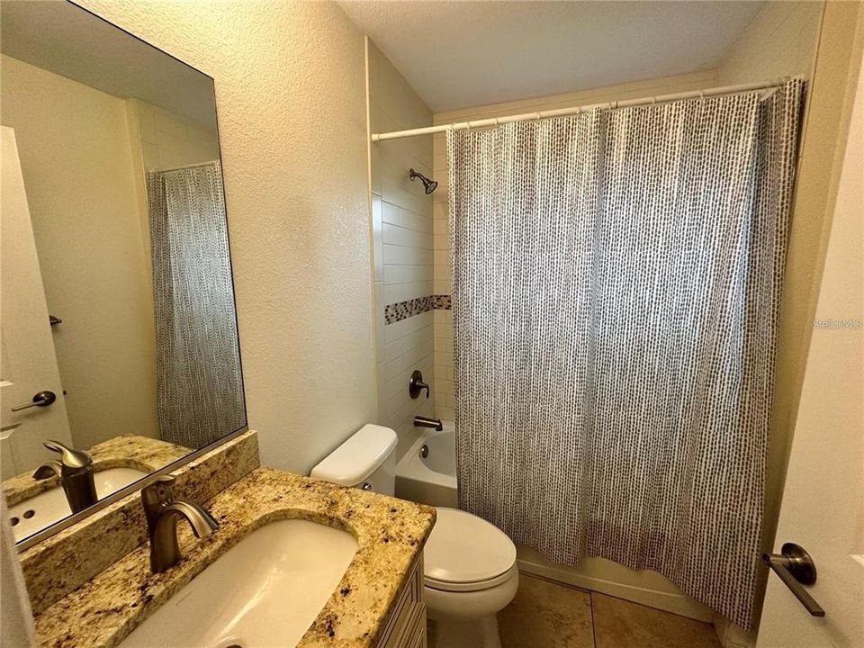 second bathroom with tub