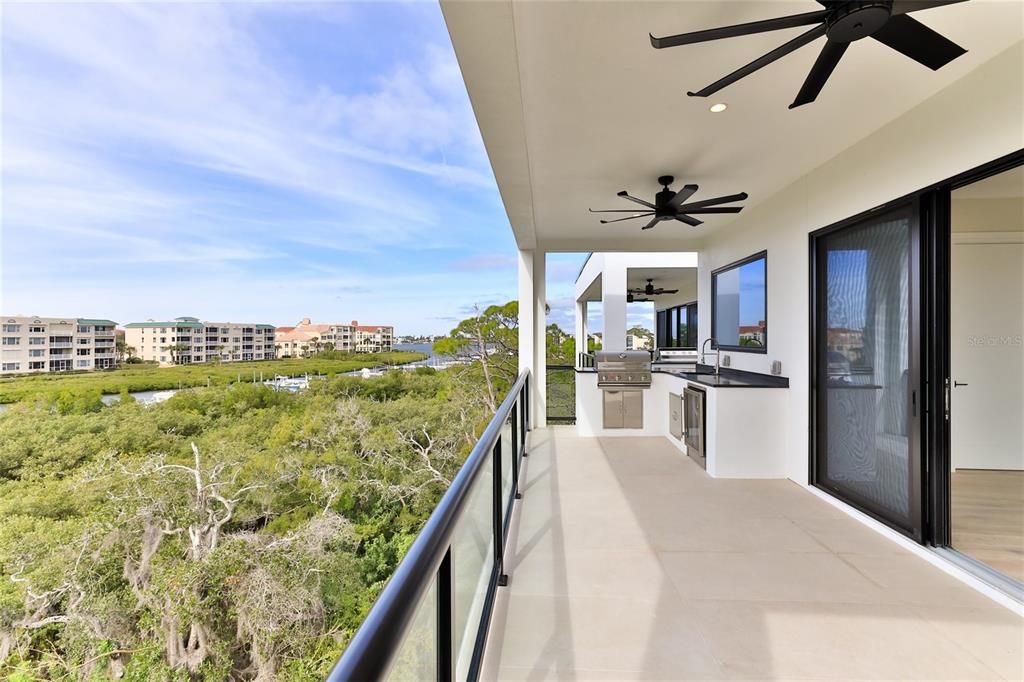 Large 3rd floor balcony with summer kitchen and endless sunsets