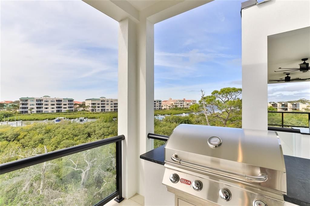 Large 3rd floor balcony with summer kitchen and endless sunsets