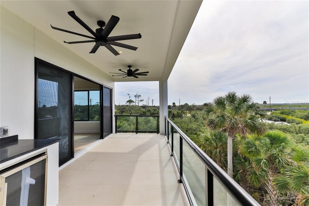 Large 3rd floor balcony with summer kitchen and endless sunsets