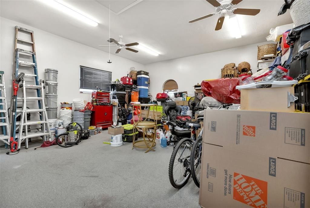 garage, currently used as storage space, but can be easily converted back to a usable garage.