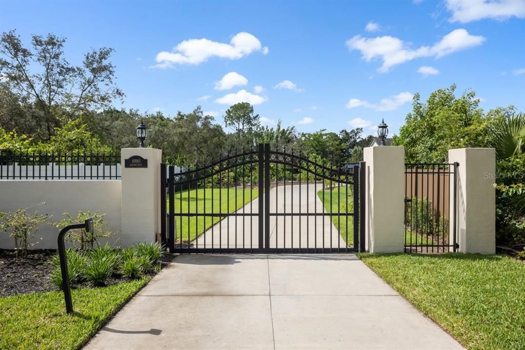 Private entrance leading to a verdant garden where seclusion and sustainability meet luxury.