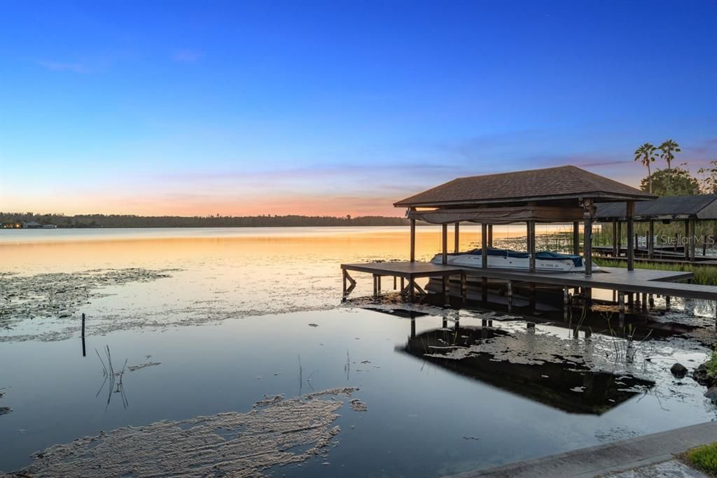 A quiet lakeside retreat that blends seclusion with understated elegance, all while being remarkably situated at the heart of Orlando's finest.