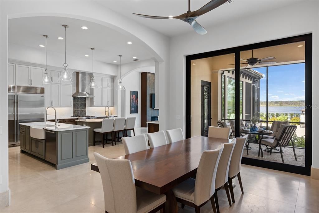 Chic dining room adjoining the gourmet kitchen, with seamless access to an al fresco patio dining experience.