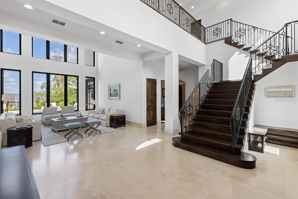 Immaculate marble floors throughout the living area embody the estate’s quiet elegance.