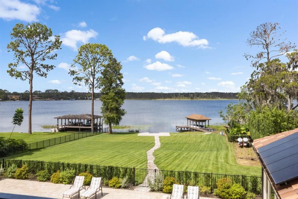 Boasting 120 feet of pristine lake frontage, this property offers a vast, scenic waterside expanse.