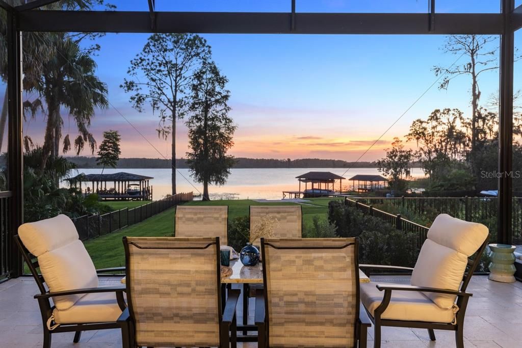 Evening's glow enhances this lakeside retreat, offering an ambiance where dusk dining becomes a memorable affair.