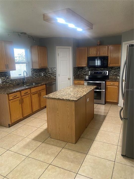 Kitchen with Island  - stainless Steel Appliances