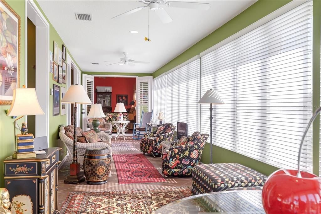 Sun Porch (enclosed) with tile flooring, ceiling fans, impact windows and River Views