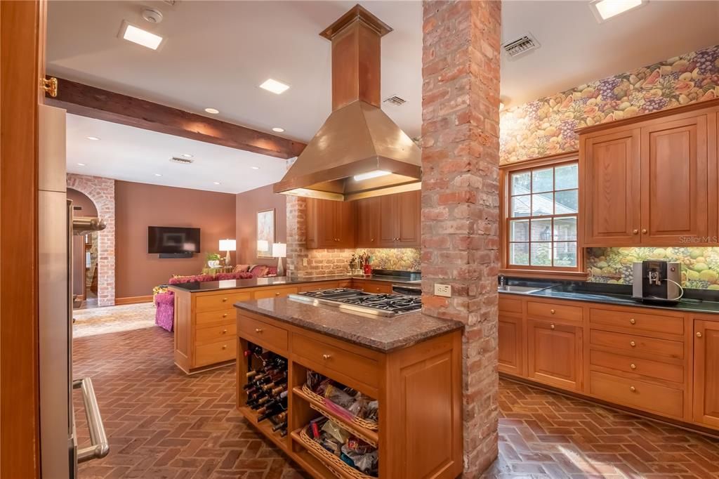 Lovely brick accents in kitchen.