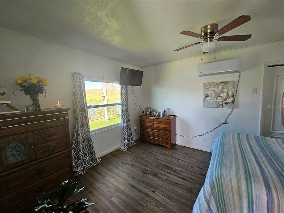 Bedroom with a water view