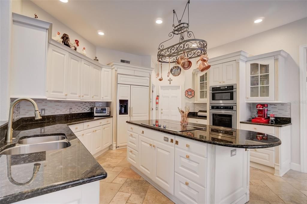 Kitchen with Stone Countertops and Large Island