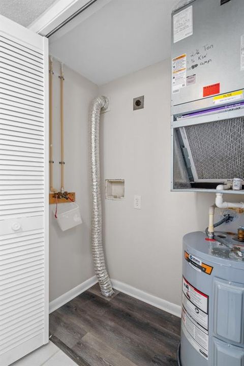 Laundry closet with washer and dryer hook ups