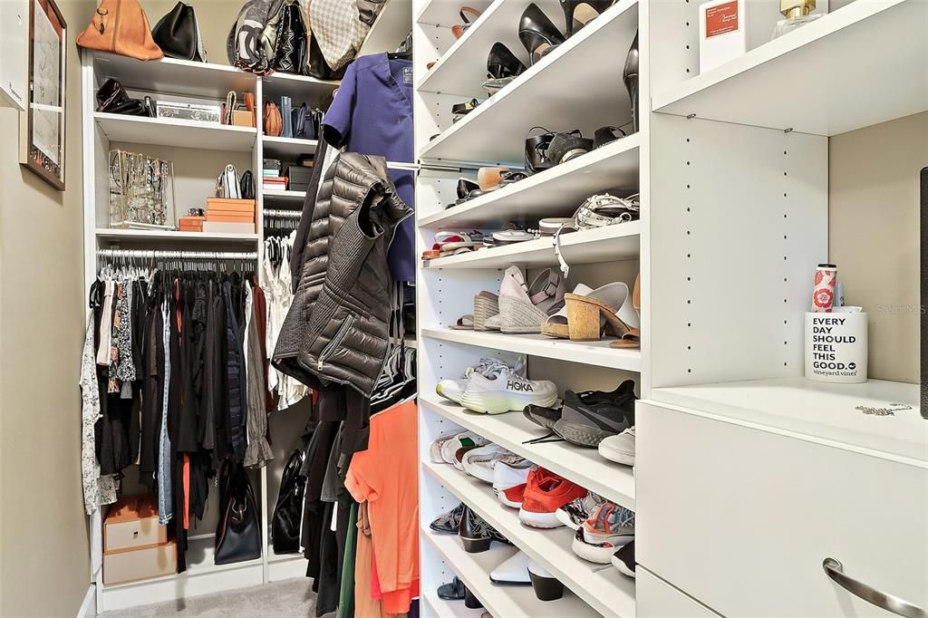 Large walk in closet - custom designer  shelving