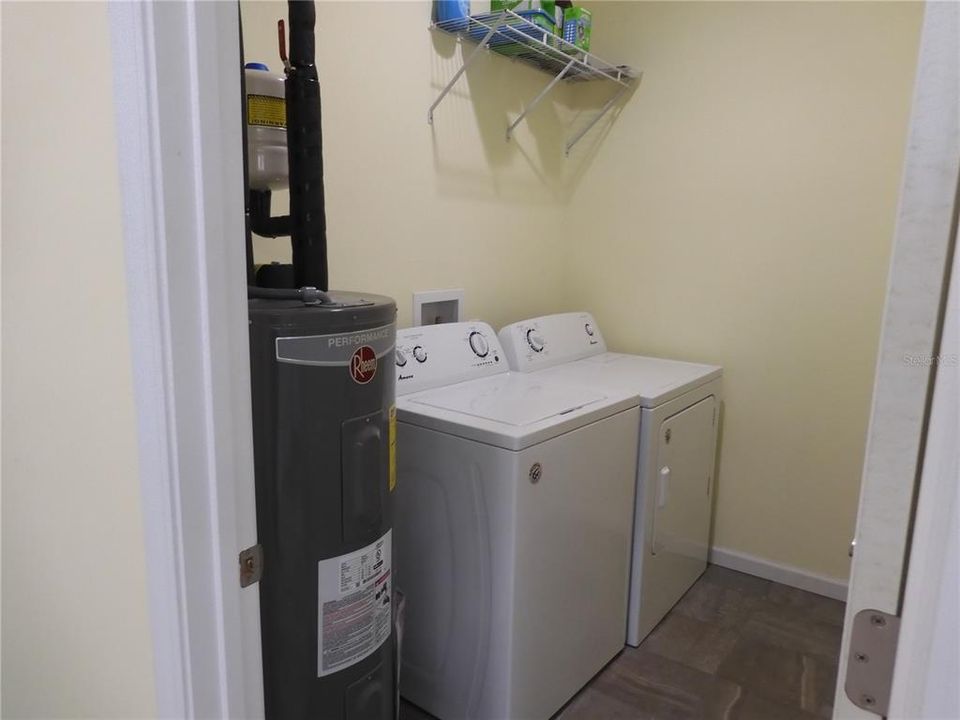 Laundry room has water heater