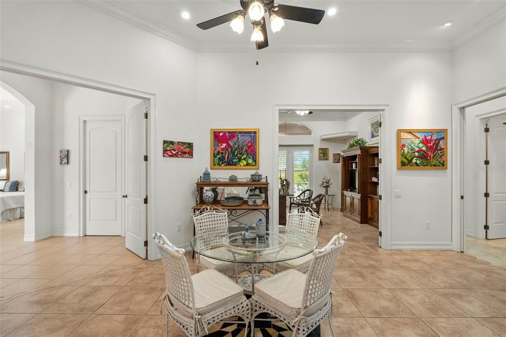 The double door entry and foyer leading to the master suite