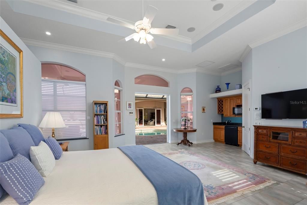 The caretaker suite features a private entrance, walk in closet, full bath and wet bar.