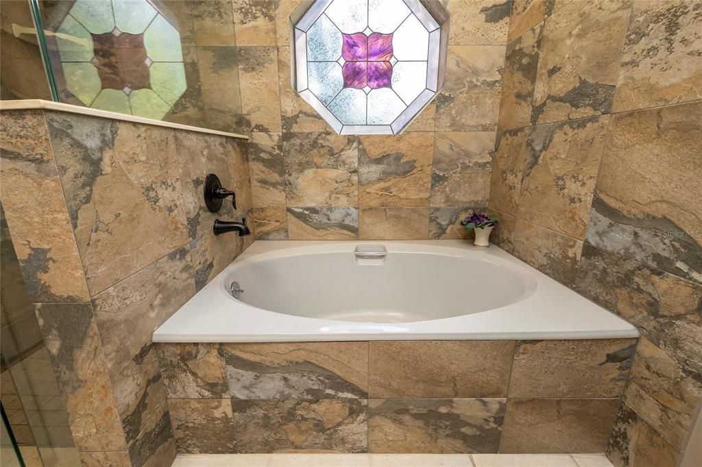 Fabulous soaking tub in primary bathroom