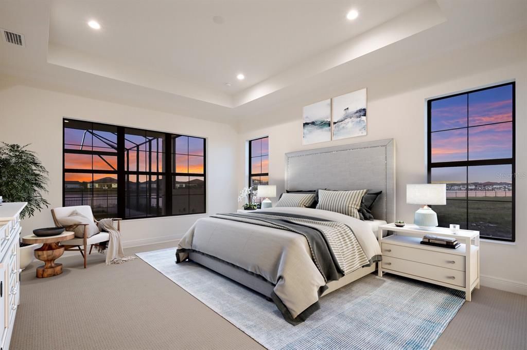 Primary Bedroom with view of water