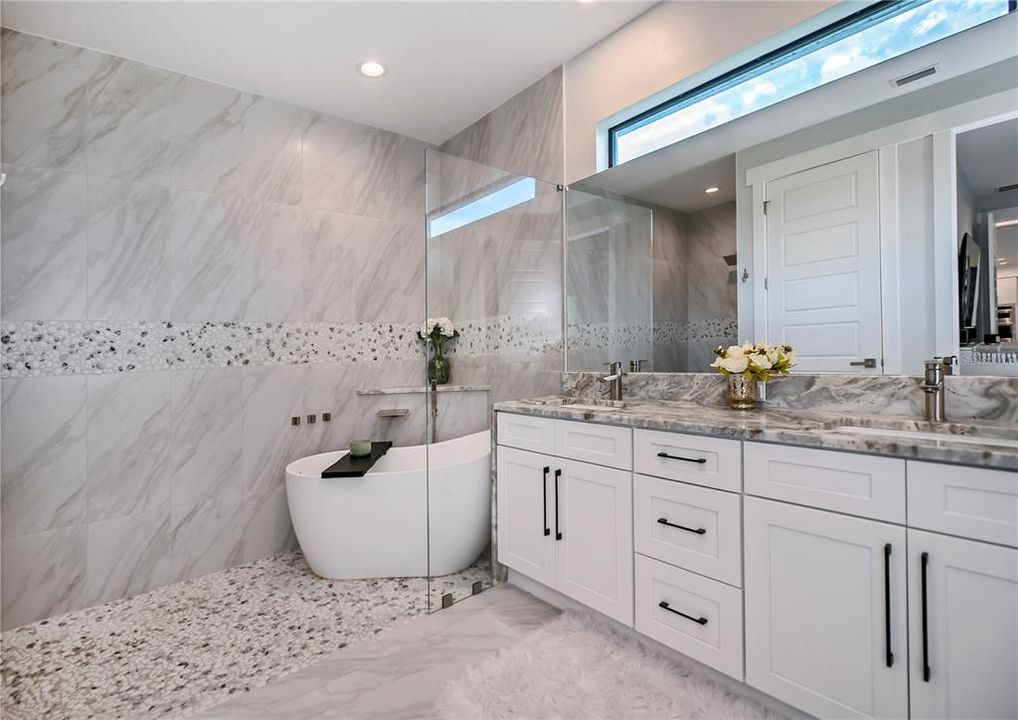 Incredible master en-suite bathroom with dual sinks