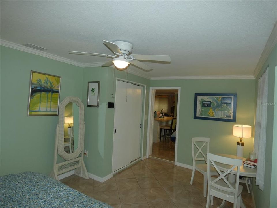 3rd bedroom, entertainment room, den with private door to back patio.
