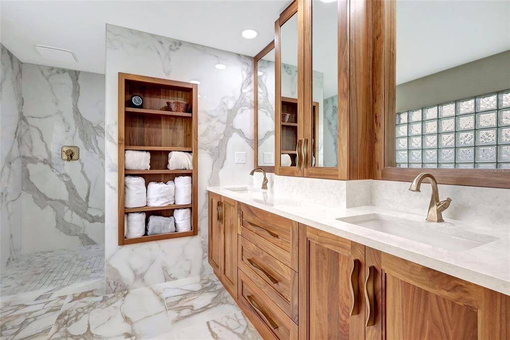 Step into your own luxurious hotel-inspired primary bathroom adjacent to the bedroom.