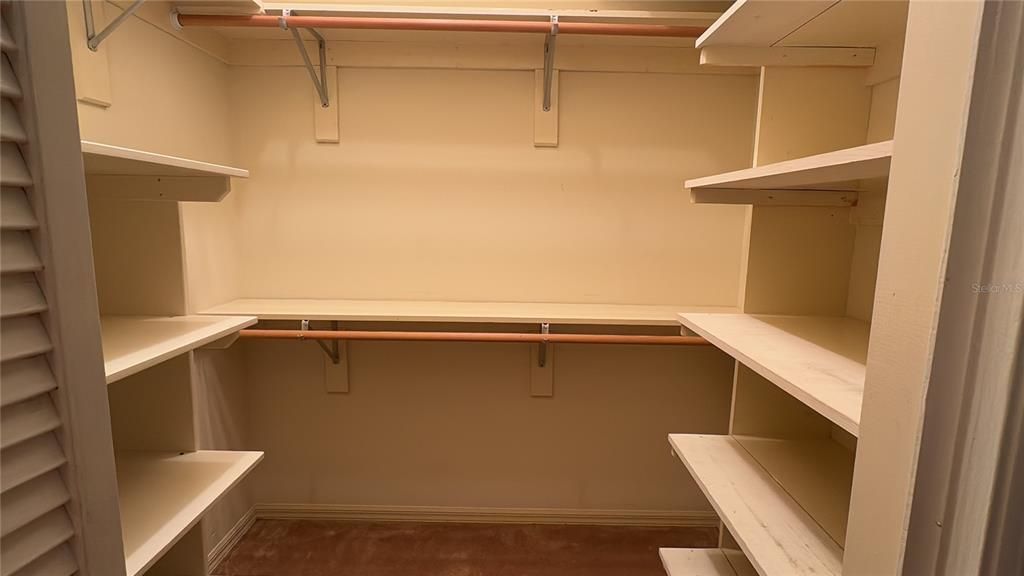 One of four large, walk-in closets