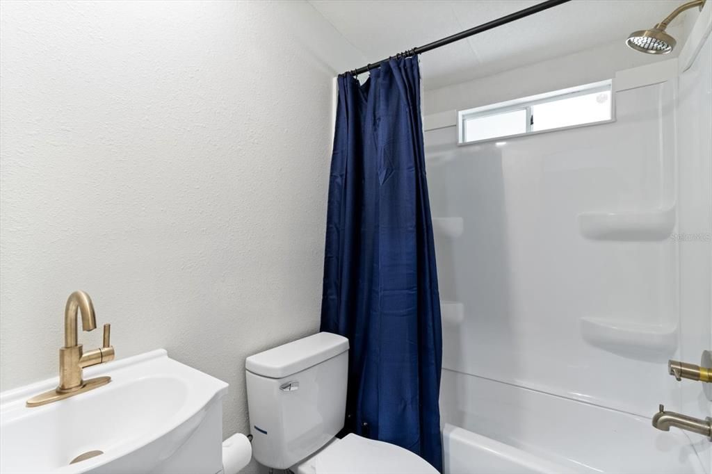 Updated Guest Bathroom w/ New Vanity, Toilet & Shower/Tub Enclosure
