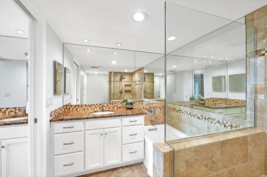 Granite compliments both vanities in Master Bath