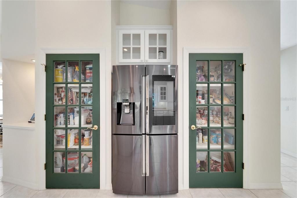 His/Hers walk-in closets in primary bedroom