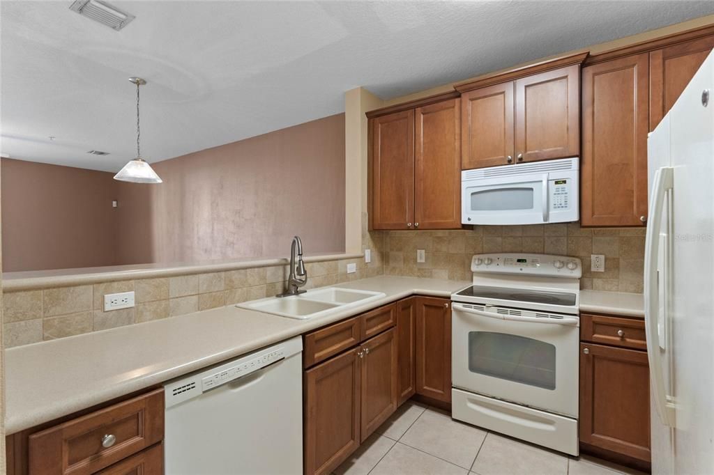 Kitchen with wood shaker style cabinets