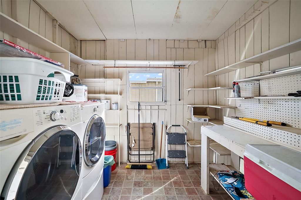SHED WITH LAUNDRY (WASHER/DRYER REMAINS WIITH HOME)