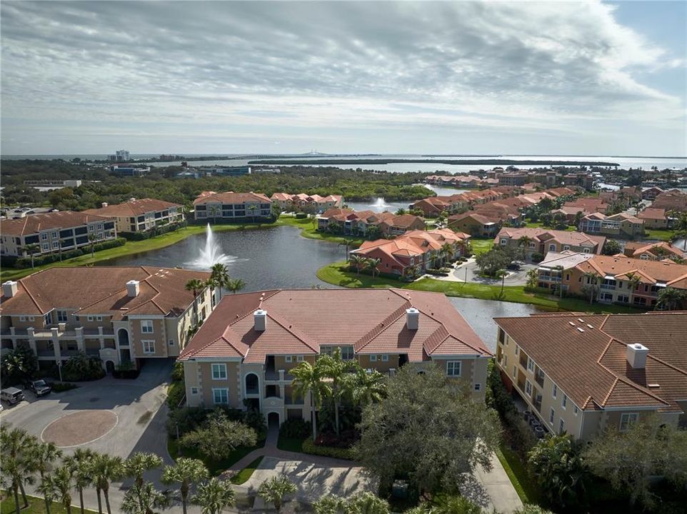 Aerial photo shows new 2023 roof and spectacular views of Marina Bay's largest lagoon with the Sunshine Skyway on the horizon.