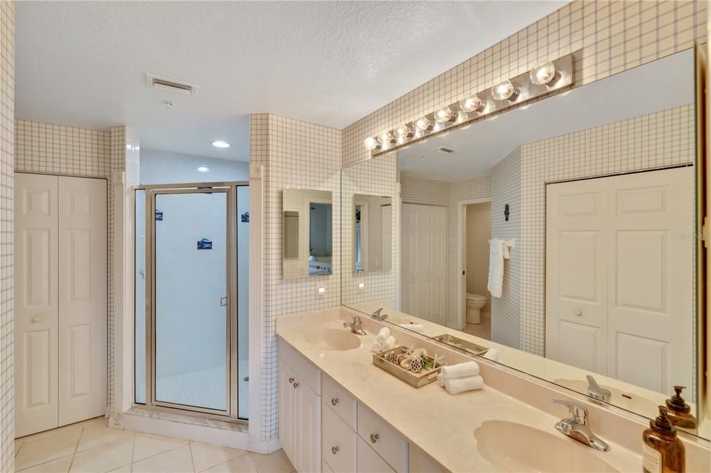 Ensuite with large walk in shower & linen closet