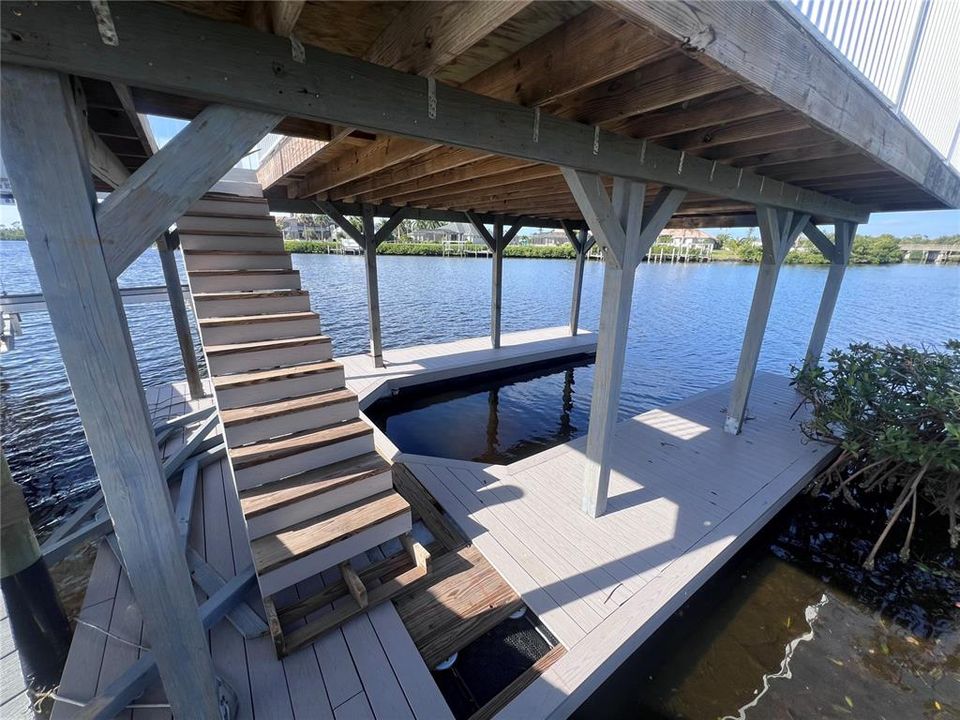 Jet ski storage and stairs to upper balcony deck