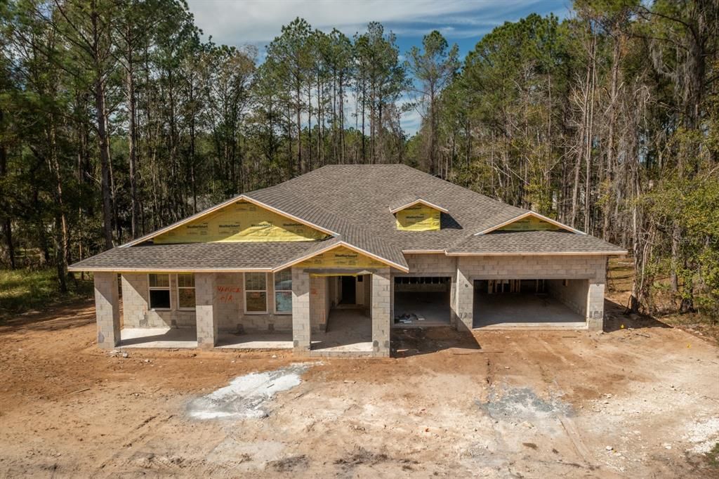 Trees wrap the home for a little privacy