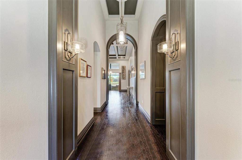 front entry w/ soaring 16ft ceiling and arch