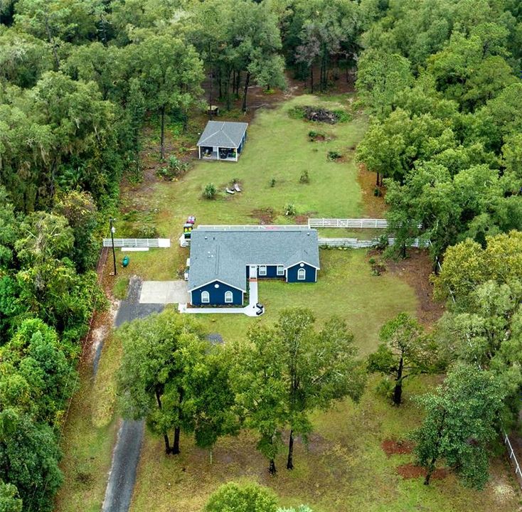 Almost 3 acres home and detached building!