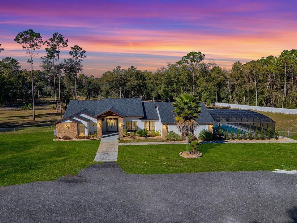 SPECTACULAR REMODELED 3 BEDROOM, 3 BATH AND POOL SITUATED ON 11.99 ACRES!