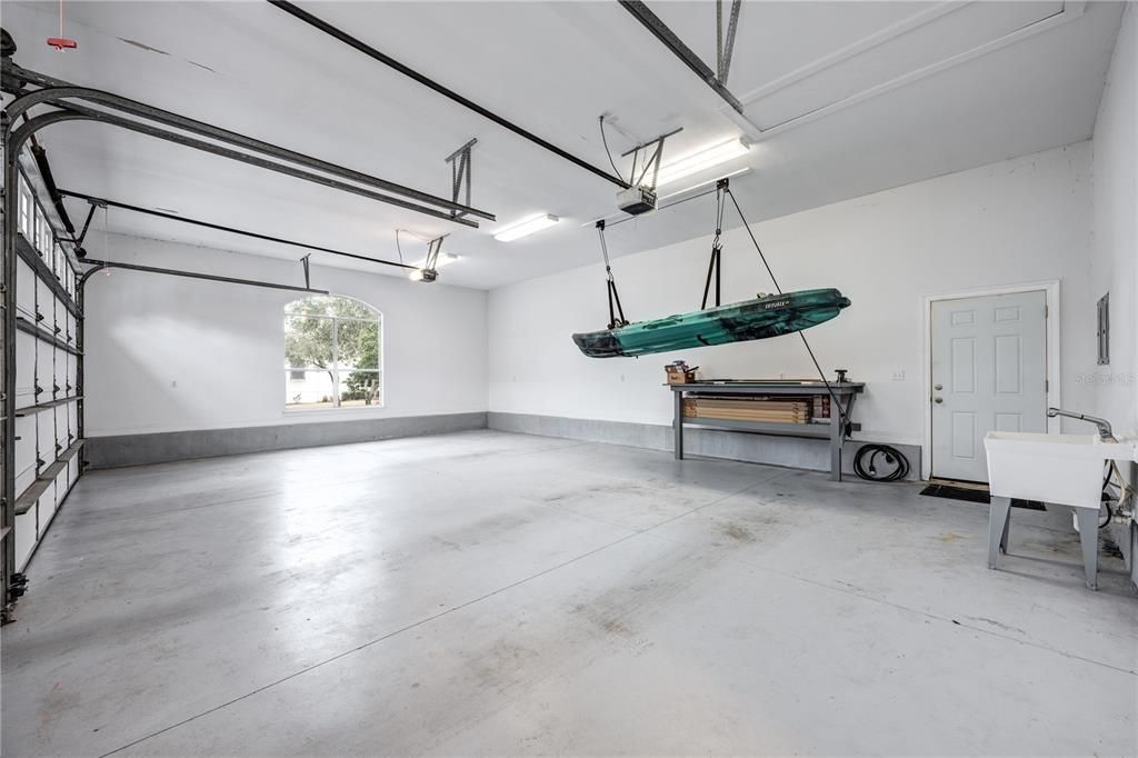 Oversized 3 car garage with 16 ft. ceilings.