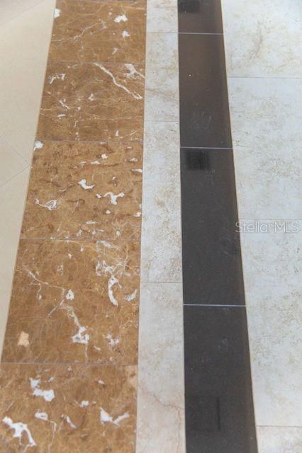 GRNITE, MARBLE AND PORCELAIN FLOORING