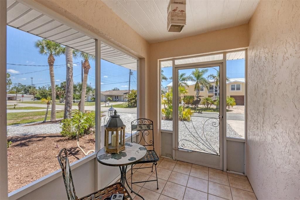 Enclosed Front Porch makes it easy to leave the front door open to enjoy the balmy coastal breezes.