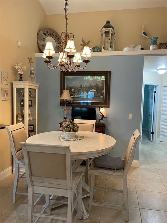 Dining area w/ plant shelf